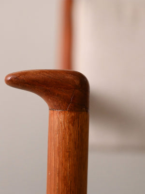 Poltrona imbottita con struttura in teak 7