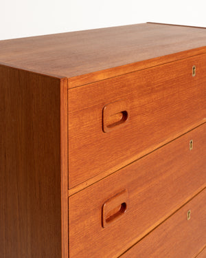 Cassettiera scandinava in teak dal profilo razionalista