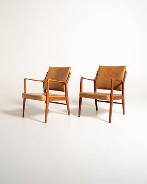 Coppia di poltroncine scandinave in similpelle, anni ’60