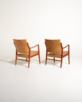 Coppia di poltroncine scandinave in similpelle, anni ’60