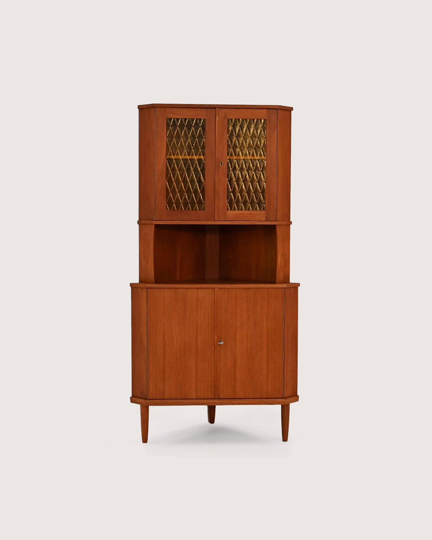 Angoliera scandinava mid-century in teak, anni ’50